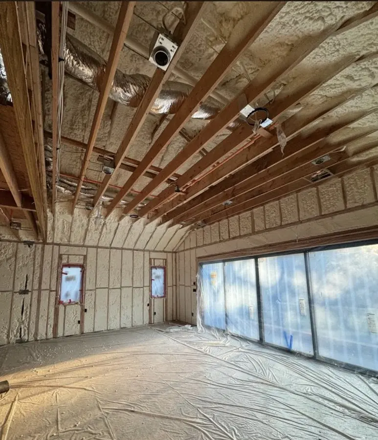Interior walls and ceiling insulated with spray foam during new construction in Olivehurst